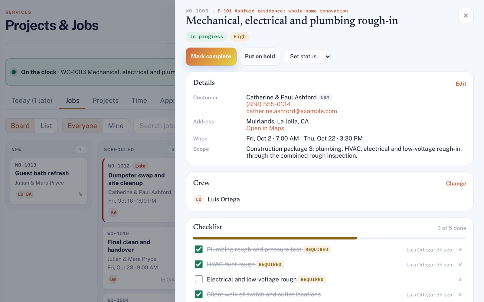 Work order WO-1003, a mechanical, electrical and plumbing rough-in, open beside the jobs board: customer, address, schedule, scope, crew and a checklist 3 of 5 done.